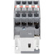 An Avantco replacement contactor with grey and white electrical devices and holes.