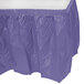 A purple plastic table skirt.