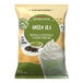 A bag of green powder labeled "Big Train Dragonfly Green Tea Blended Creme Frappe Mix" on a white background.
