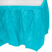 A Bermuda Blue plastic table skirt on a white background.
