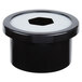 A black plastic knob with a white hole on a black and white plastic container.