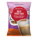 A bag of Big Train Decaf Spiced Chai Tea Latte Mix with a picture of a cup of chai tea.