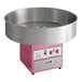 A Carnival King cotton candy machine with a stainless steel bowl on a counter.