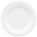 A close-up of a GET Diamond White Melamine Plate with a wide white rim.