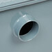 A close-up of a grey Watts WD-50 grease trap pipe.