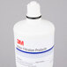 A white 3M water filtration system bottle with a label and black ring.