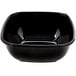 A black square Sabert catering bowl with a lid.