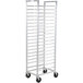 A white metal rack with shelves and wheels for 19 steam table pans.