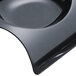 A Fineline black plastic tray with curved edges.