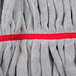 A close up of a red and gray striped Unger SmartColor tube mop head.