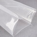 An ARY VacMaster 7" x 12" chamber vacuum packaging bag. A clear plastic bag on a grey surface.