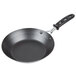 A black Vollrath frying pan with a black TriVent silicone handle.