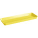 A yellow rectangular Cambro market tray with handles.