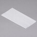 Durable Packaging interfolded wax paper on a white surface.