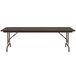 A Correll walnut folding table with a metal frame.