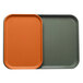 Two Cambro rectangular trays with orange and grey customizable inserts.