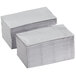 A stack of silver and gray 2-ply paper napkins.