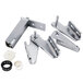 A group of stainless steel self closing door hinge parts.