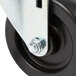 A close-up of a black Turbo Air swivel stem caster wheel with a metal bolt.