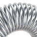 A close-up of a heavy tension silver metal extension spring.