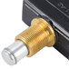 A close up of a metal and gold All Points micro switch.