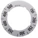 A circular white dial insert with black numbers for a Garland range.