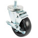 A close-up of a Turbo Air swivel stem caster with a black metal wheel and nut.