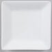 A 3" bright white square porcelain plate with a small white rim on a gray surface.