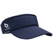 A close-up of a navy blue Headsweats visor with a white logo.