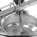 A Tellier tin-plated rotary food mill with a metal sieve and metal handle.