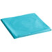 A Bermuda Blue Creative Converting OctyRound plastic table cover folded into a rectangle on a white background.
