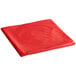 A red folded table cover with a white background.