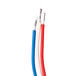 A close-up of a red, white, and blue electrical wires.