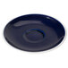 A blue saucer with a white rim.