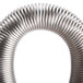 A metal spring with a spiral shape on a white background.