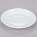 A CAC Venice white saucer with a small rim.