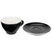 A black and white CAC Venice coffee cup and saucer set.