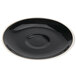 A black saucer with a white rim.