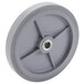 A gray wheel with a metal center and a hole.
