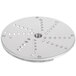 A Robot Coupe stainless steel grating/shredding disc with circular holes.