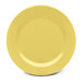 A close-up of an Elite Global Solutions Urban Naturals Olive Oil melamine plate with a yellow surface.