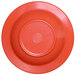 A red melamine bowl with a circle on the bottom.