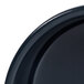 An Elite Global Solutions Lapis blue melamine ramekin on a black plate.