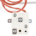 A white thermostat with metal screws and wires.