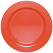 A close-up of a red Elite Global Solutions Rio Spring Coral melamine plate.