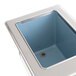A Delfield stainless steel drop in ice chest with a cover in a counter.