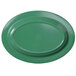 An Elite Global Solutions Rio Autumn Green oval melamine platter on a table.