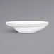 A close-up of a white Elite Global Solutions melamine bowl with a rim.