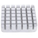 A white square Vollrath push block with many small squares on it.