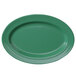 A green oval melamine platter with a white surface.